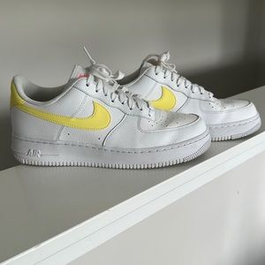 Woman’s Nike Air Force 1 white with yellow tennis shoe, size 11